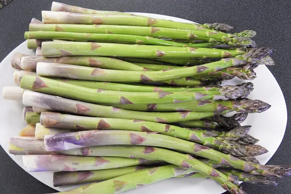 Fresh asparagus spears on a plate