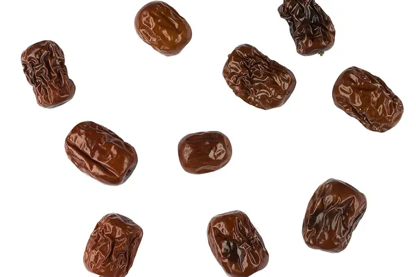 Dried jujube (Ziziphus jujuba) fruits on a white background