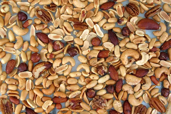Mixed nuts spread out on a table