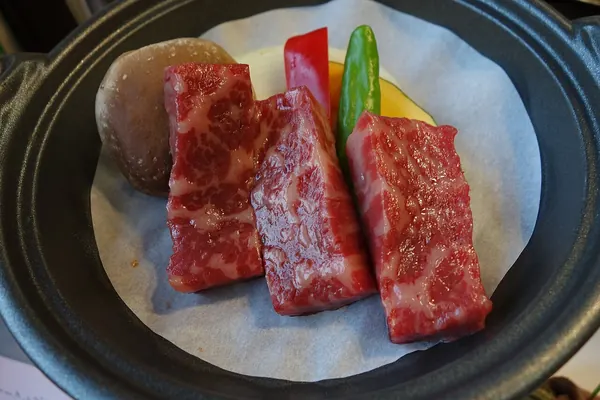 Raw marbled beef steaks