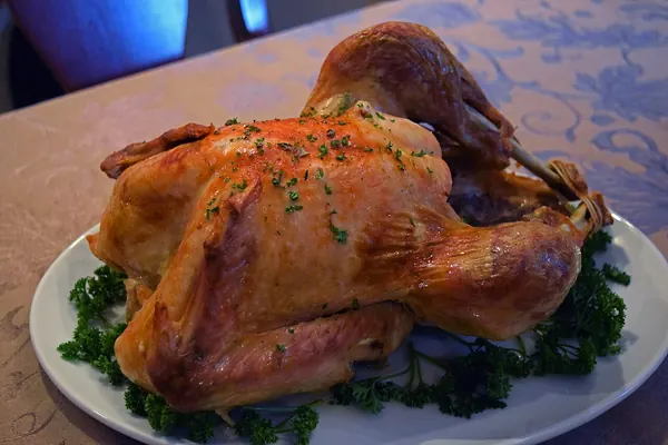Whole roast turkey on a platter