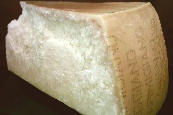 Wedge of Parmigiano Reggiano cheese