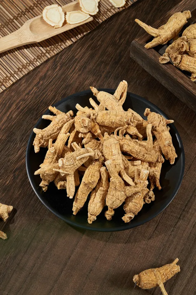 Dried tongkat ali root pieces in a bowl (illustrative photo)
